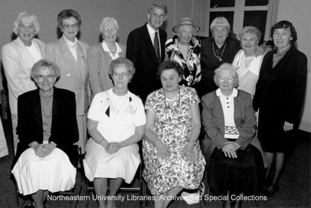 Vivian, standing in the back row wearing a hat, attended a 50th reunion for Northeatern's first female class, in 1993.